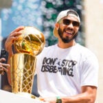 Jayson Tatum celebrates during a duck boat parade to celebrate the 18th Boston Celtics NBA championship on Friday, June 21, 2024. The Celtics defeated the Dallas Mavericks in Game 5 of the NBA Finals.