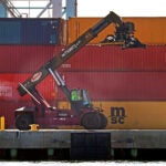 Containers were being loaded and unloaded at the Conley Container Terminal in South Boston.