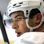 The Boston Bruins held their development camp at Warrior Ice Arena. Matt Poitras takes a breather.