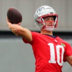 The Patriots held practice at the Gillette Stadium practice field. Drake Maye throws a pass during a drill.