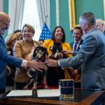 “Ollie’s Law” was ceremonially signed on Thursday to protect animals in the care of boarding facilities and kennels.