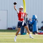 New England Patriots quarterback Drake Maye (10) throws during practice at Gillette Stadium.
