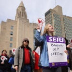 Anne Curtis, a Graduate Student at Boston University (R) rallied along with fellow grad students and allies as BU graduate worker students went on strike for fair pay, better healthcare coverage, and stronger benefits in March.