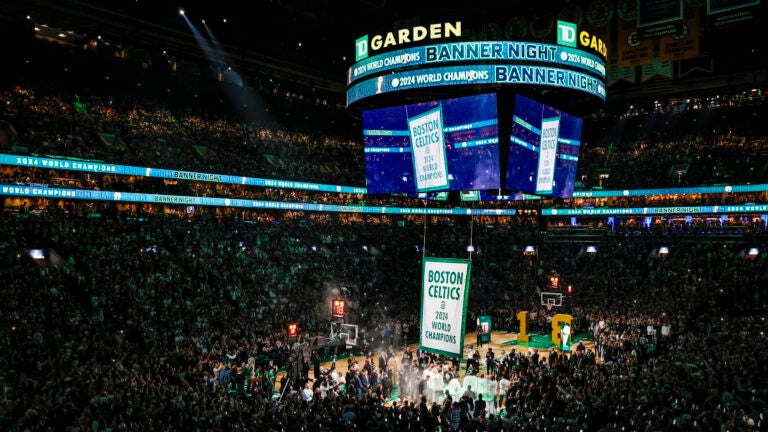 The No. 18 NBA championship banner rises from the rafters of TD Garden commemorating the Boston Celtics 2024 NBA title.