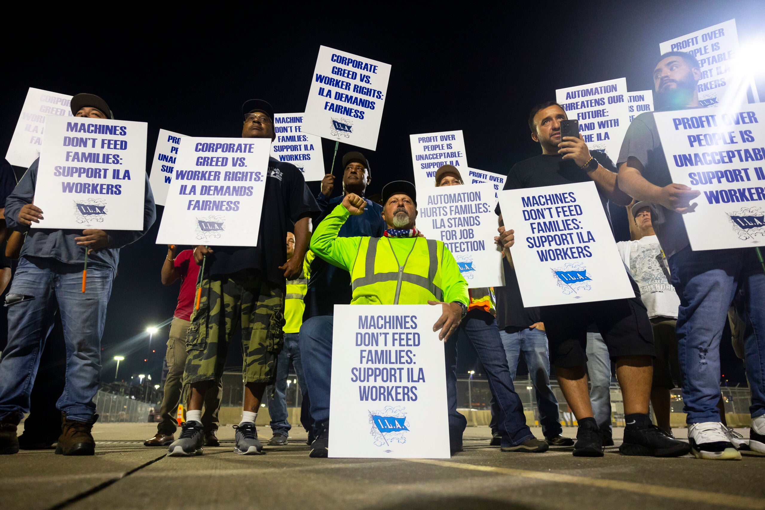 Midnight longshoremen strike at Houston's Bayport terminal.