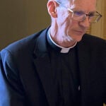Then-Rev. Msgr. John McDermott attends a Vermont Senate Judiciary Committee at the State House.