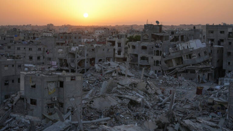 Destruction left by the Israeli air and ground offensive is seen in Khan Younis, Gaza Strip.