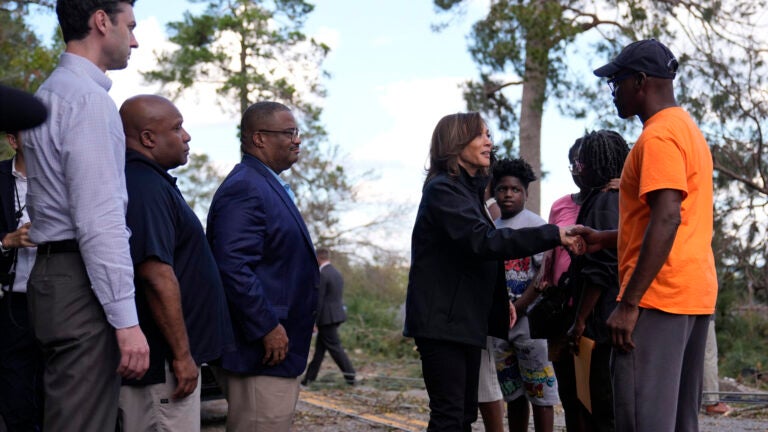 Democratic presidential nominee Vice President Kamala Harris greets people who were impacted by Hurricane Helene in Augusta, Ga., Wednesday, Oct. 2, 2024, as from left, Sen. Jon Ossoff, D-Ga., FEMA deputy direct Erik Hooks and Augusta Mayor Garnett Johnson watch.