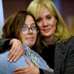 Alexandra Eckersley, who was convicted on charges that she abandoned her newborn in the woods, hugs her mother, Nancy Eckersley, after her sentence was suspended at a hearing at Hillsborough County Superior Court in Manchester, N.H., on Thursday, Oct. 17, 2024.