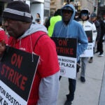 Hotel workers strike outside of the Hilton Boston Park Plaza on Sunday.