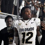 Colorado wide receiver Travis Hunter (12) leaves the field after an NCAA college football game against Central Florida, Saturday, Sept. 28, 2024, in Orlando, Fla.