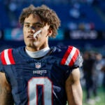 New England Patriots cornerback Christian Gonzalez (0) reacts to being defeated by the Miami Dolphins 15-10 in an NFL football game on Sunday, Oct. 6, 2024, in Foxborough, Mass.