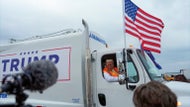 Trump boards a garbage truck to draw attention to Biden remark