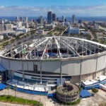 The roof of the Tropicana Field is damaged the morning after Hurricane Milton hit the region.