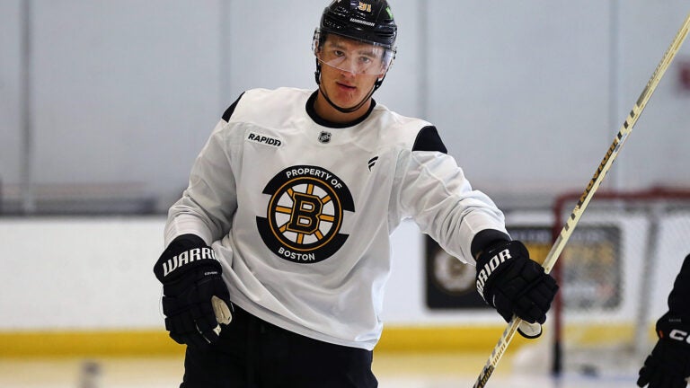 The Bruins training camp continued on Thursday at Warrior Ice Arena. Nikita Zadorov spins his stick during warmups.