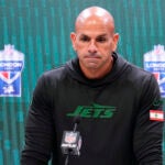 Jets head coach Robert Saleh talks to reporters after a game against the Vikings.