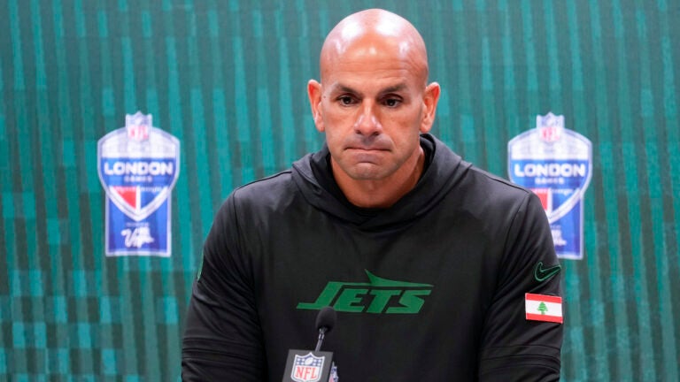 Jets head coach Robert Saleh talks to reporters after a game against the Vikings.