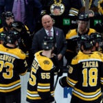 Boston Bruins head coach Jim Montgomery talks during a timeout in the third period at TD Garden.
