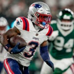 New England Patriots wide receiver DeMario Douglas (3) carries the ball against the New York Jets during the first quarter of an NFL football game, Thursday, Sept. 19, 2024, in East Rutherford, N.J.