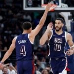 ABU DHABI, UNITED ARAB EMIRATES - JULY 15: Jayson Tatum #10 and Stephen Curry #4 of the United States react during the first half of an exhibition game between the United States and Australia ahead of the Paris Olympic Games at Etihad Arena on July 15, 2024 in Abu Dhabi, United Arab Emirates.