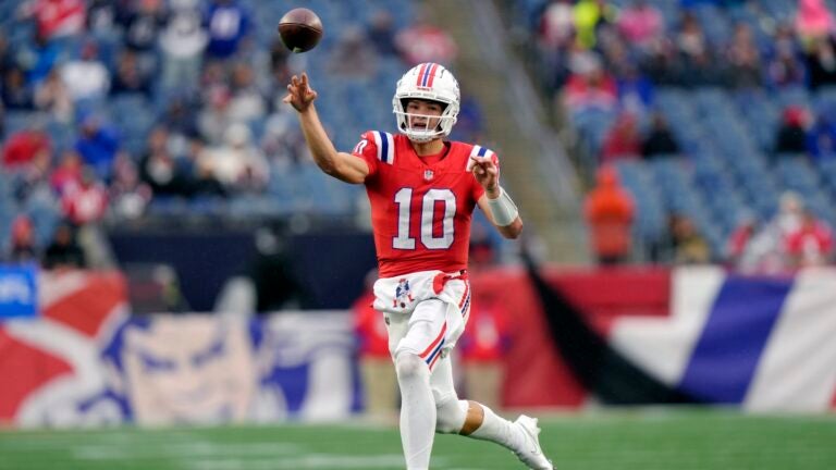 Drake Maye passes the ball during a game against the Texans.