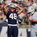 FOXBOROUGH, MASSACHUSETTS - OCTOBER 06: Jahlani Tavai #48 of the New England Patriots reacts during the fourth quarter against the Miami Dolphins at Gillette Stadium on October 06, 2024 in Foxborough, Massachusetts.