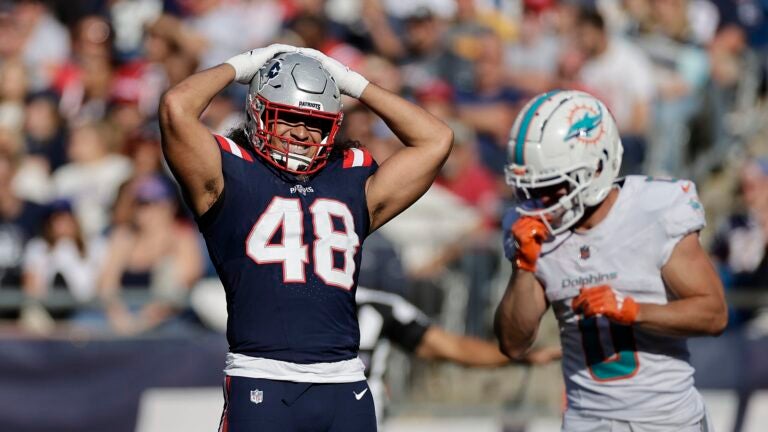 FOXBOROUGH, MASSACHUSETTS - OCTOBER 06: Jahlani Tavai #48 of the New England Patriots reacts during the fourth quarter against the Miami Dolphins at Gillette Stadium on October 06, 2024 in Foxborough, Massachusetts.