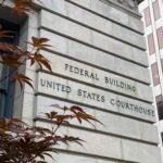 US District Court in Providence, R.I. A North Attleboro insurance broker was sentenced to federal prison on Tuesday.