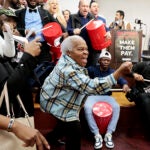 Workers, including Antonia David rejoice after the vote. Employees with Omni Hotels, represented by Unite Here Local 26, ratify a contract. They voted at 26 West Street.