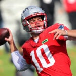 The NE Patriots practiced at the Gillette Stadium practice field. Qb Drake Maye fires a long pass during a drill.