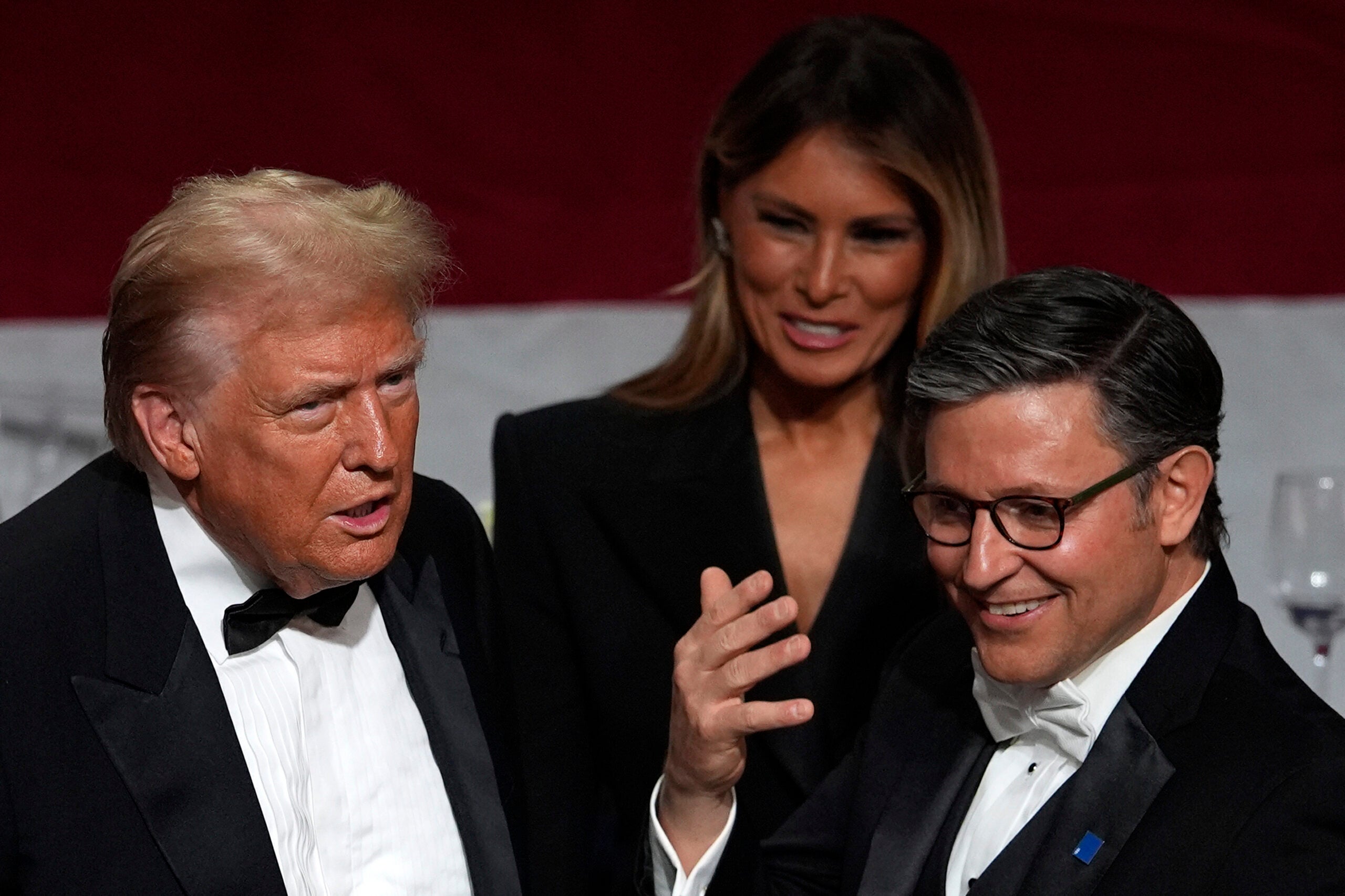 Republican presidential nominee former President Donald Trump and former first lady Melania Trump talks with House Speaker Mike Johnson of La., at the 79th annual Alfred E. Smith Memorial Foundation Dinner, Thursday, Oct. 17, 2024, in New York.