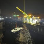 A Merrimack woman was hospitalized after driving a pickup truck into a river in Nashua, New Hampshire on Tuesday.