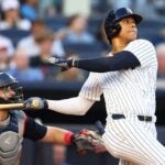 NEW YORK, NEW YORK - AUGUST 21: Juan Soto #22 of the New York Yankees hits a first inning 2-run home run against the Cleveland Guardians at Yankee Stadium on August 21, 2024 in New York City.