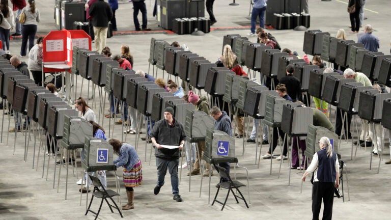 Voters fill out their ballots on Election Day.