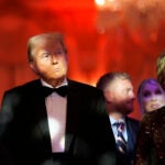 President-elect Donald Trump listens with Linda McMahon.