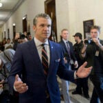 Pete Hegseth, President-elect Donald Trump's pick for secretary of defense, speaks with reporters following a meeting with senators on Capitol Hill, Thursday, Nov. 21, 2024, in Washington.