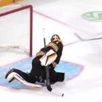 Columbus Blue Jackets right wing Justin Danforth scores against Bruins goaltender Jeremy Swayman during the third period.