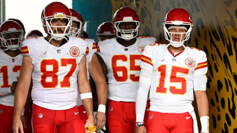 Travis Kelce and Patrick Mahomes wait to lead the team onto the field before a preseason game against the Jaguars.