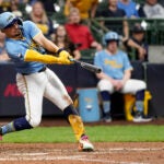 Milwaukee Brewers' Willy Adames hits an RBI-double during the eighth inning of a baseball game against the Arizona Diamondbacks, Sunday, Sept. 22, 2024, in Milwaukee.