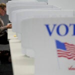 Whitney Cooper casts her ballot on Election Day, Tuesday, Nov. 5, 2024, in Canton, N.C.