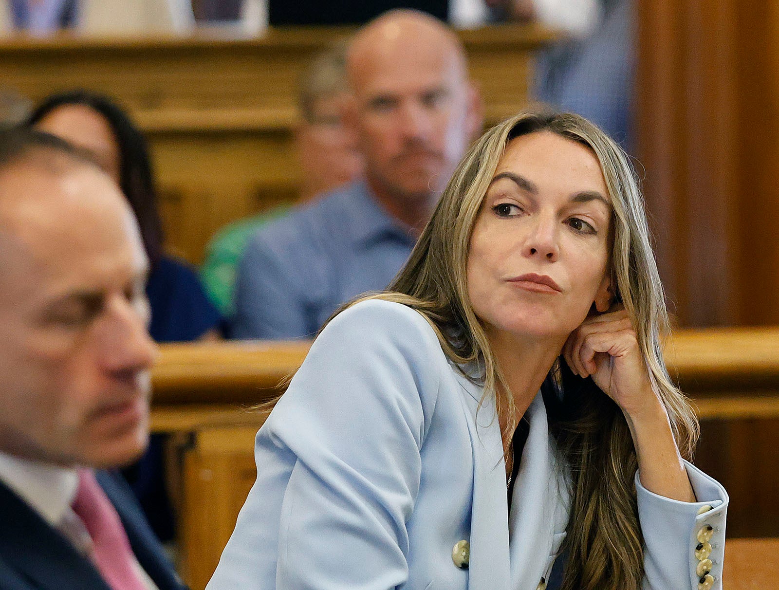 Karen Read listens to his lawyer Martin Weinberg, who was making motions to dismiss two positions against him in August.