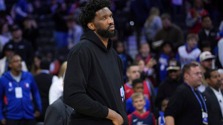 Joel Embiid looks over the court after a game against the Grizzlies.