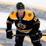 Boston Bruins' Trent Frederic plays against the Los Angeles Kings during the third period of an NHL hockey game, Saturday, Oct. 12, 2024, in Boston.