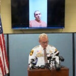 This still image provided by Green Lake County Sheriff's Office, Sheriff Mark Podoll holds a news conference regarding Ryan Borgwardt, who faked his own drowning this summer on Thursday, Nov. 21, 2024 in Green Lake, Wis.