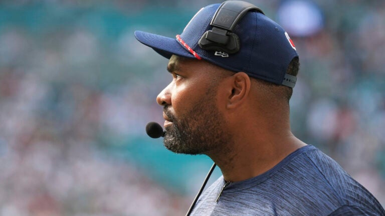 New England Patriots head coach Jerod Mayo watches the game during the first half of an NFL football game against the Miami Dolphins, Sunday, Nov. 24, 2024, in Miami Gardens, Fla.