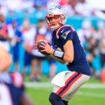 New England Patriots quarterback Drake Maye (10) looks to throw the ball during an NFL football game against the Miami Dolphins, Sunday, Nov. 24 2024, in Miami Gardens, Fla.