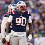 New England Patriots defensive tackle Christian Barmore (90) heads to the line of scrimmage against the Los Angeles Rams during the second half of an NFL football game, Sunday, Nov. 17, 2024, in Foxborough, Mass.