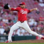 Reds' Justin Wilson throws during a game against the Astros.