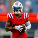 New England Patriots wide receiver Kendrick Bourne (84) warms up prior to an NFL football game against the Houston Texans, Sunday, Oct. 13, 2024, in Foxborough, Mass.