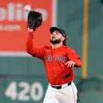 Boston Red Sox right fielder Wilyer Abreu makes the catch on the fly out by Minnesota Twins' Carlos Santana during the sixth inning of a baseball game, Friday, Sept. 20, 2024, in Boston.